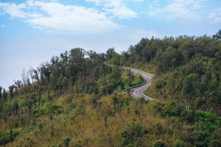 Road in the mountains and blue sky., The road to freedom