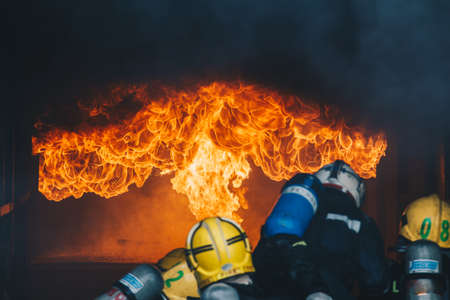 Firefighters fighting fire, Firefighters trainingの写真素材