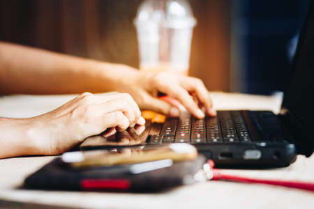 Women finger pressing laptop keyboardの写真素材