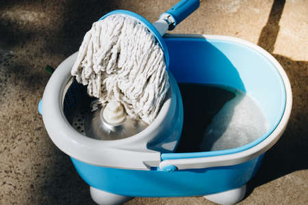 Cleaning mop .Different tools for cleaningの写真素材