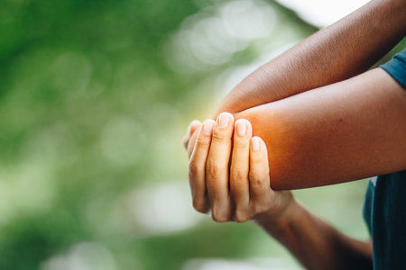 female's elbow. Arm pain and injury concept. woman with painful elbow