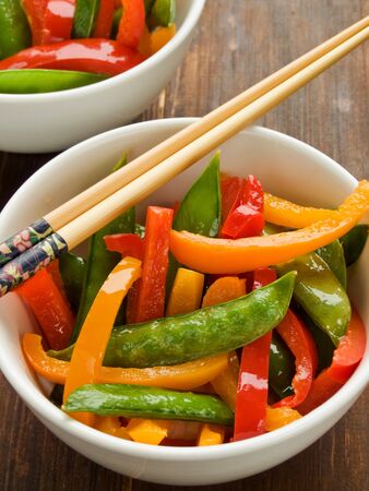 Japanese kitchen dish sticks pepper salad on the tableの写真素材