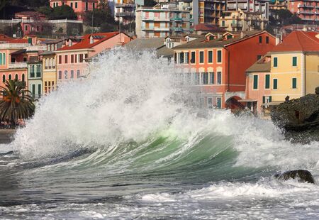 Wave of sea ocean home city splashes tsunami .の写真素材