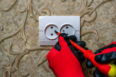 Repair of the socket, socket. Tools, voltage measuring devices. selective focus.の写真素材