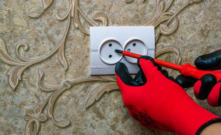 Repair of the socket, socket. Tools, voltage measuring devices. selective focus.の写真素材