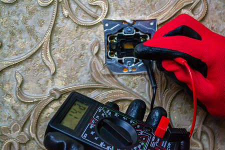 Repair of the socket, socket. Tools, voltage measuring devices. selective focus.の写真素材