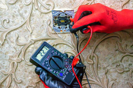Repair of the socket, socket. Tools, voltage measuring devices. selective focus.の写真素材