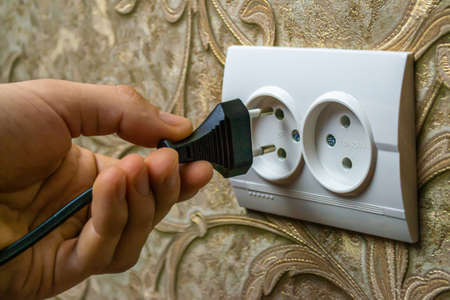 Repair of the socket, socket. Tools, voltage measuring devices. selective focus.の写真素材