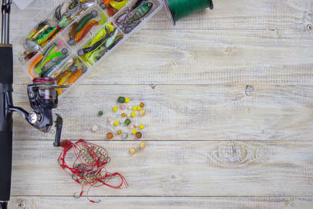 many different fishing floats in the box. fishing tackle and accessories for catching Herabunaの写真素材