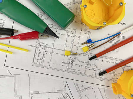 electrician tools on the background of the electrician plan. Place for text. Selective focus.の写真素材