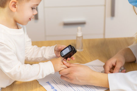 child being checked by a doctor. Selective focusの写真素材