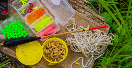 many colorful lures for fishing on the wooden pier. Selective focus. natureの写真素材