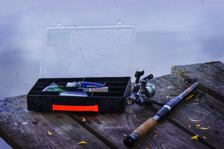 many colorful lures for fishing on the wooden pier. Selective focus. natureの写真素材