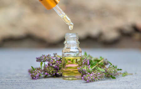 Thyme extract essential oil. Selective focus. nature green.
