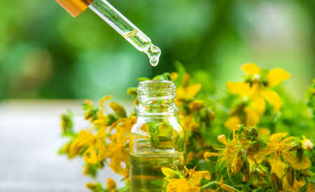An essential oil extract of St. John's wort herb. Selective focus. Nature.の写真素材