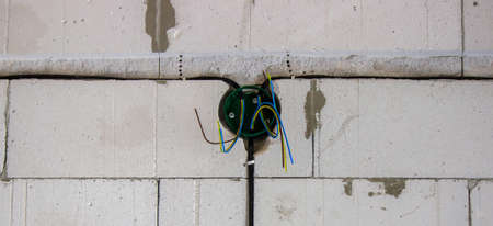electrical wiring of the house, cable on the wall in the gate. Selective focusの写真素材