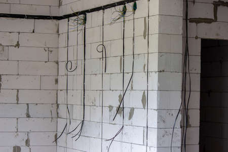 electrical wiring of the house, cable on the wall in the gate. Selective focusの写真素材