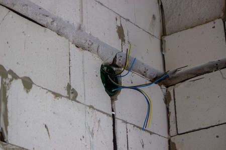 electrical wiring of the house, cable on the wall in the gate. Selective focusの写真素材