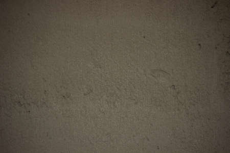 man plastering the wall. Construction, repairs in the house. Selective focusの写真素材