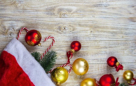 New Year's toys gifts, Christmas tree with decoration on a wooden board, New Years concept. Selective focusの写真素材