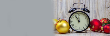 New Years gifts toys lie on a wooden background. Good