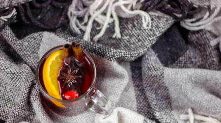 cups with hot mulled wine on a wooden background. New year conceptの写真素材