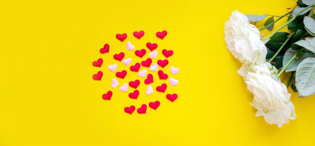 valentine's day concept on yellow background flowers heart. Selective focusの写真素材