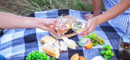 couple in love drinks wine at a picnic. Selective focus. Natureの写真素材