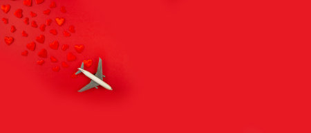 Valentine's card, beautiful red background with airplanes. selective focus. love.