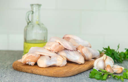 Raw meat chicken wings on a board. selective focus. Nature.の写真素材