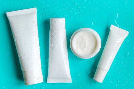 Moisturizing cream on a blue background. selective focus. Nature.の写真素材