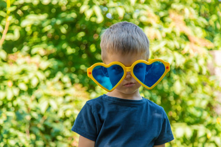 Children enjoy nature in glasses. selective focus. Nature.