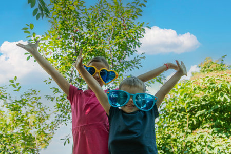 Children enjoy nature in glasses. selective focus. Nature.の写真素材