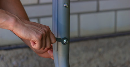 man collects garden furniture, close-up. selective focusの写真素材