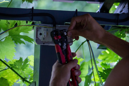 electrician to connect the outlet. selective focusの写真素材