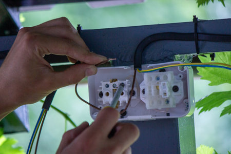 electrician to connect the outlet. selective focusの写真素材