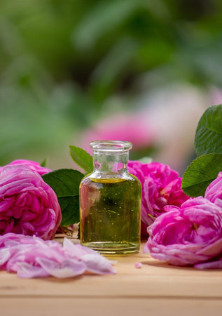 rose flower and essential oil. Spa and aromatherapy. selective focusの写真素材