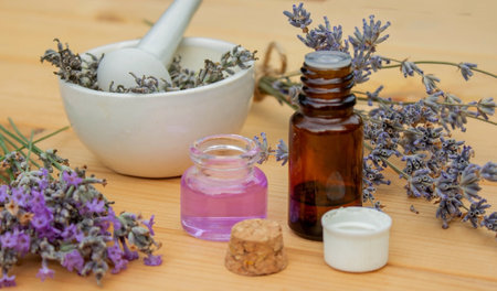 lavender essential oil, on a wooden background. selective focus. Natureの写真素材