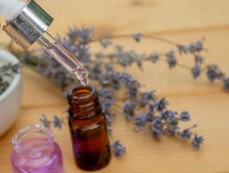 lavender essential oil, on a wooden background. selective focus. Natureの写真素材