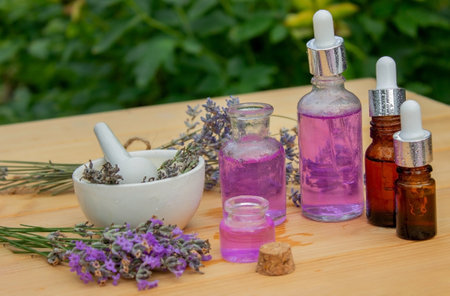 lavender essential oil, on a wooden background. selective focus. Natureの写真素材