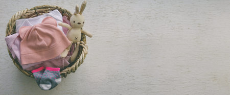 children's things in the basket. washing children's clothesの写真素材