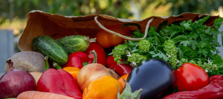fresh vegetables on a wooden background in a paper bag. Selective focus.