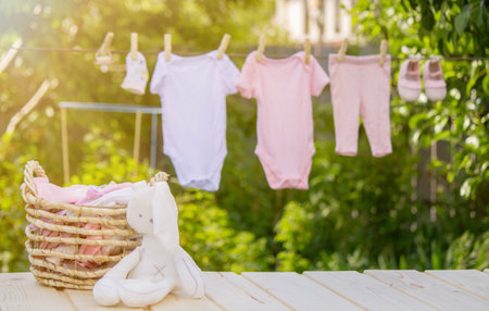 Children's clothes are dried outside. Selective focusの写真素材