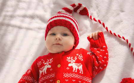 baby, little girl dressed as Santa Claus. holiday.