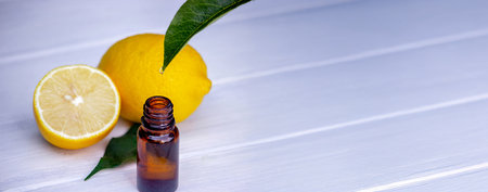 lemon oil in jars, fresh lemon. Selective focusの写真素材