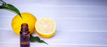 lemon oil in jars, fresh lemon. Selective focusの写真素材