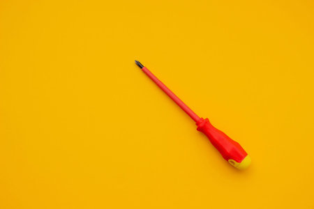 Electrical Tools and Equipment on Yellow Background.の写真素材