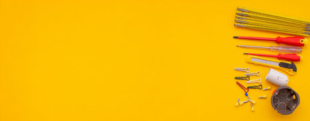 Electrical Tools and Equipment on Yellow Background.の写真素材