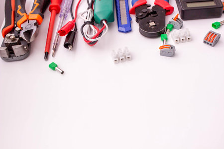 Electrical Tools and Components on White Background.