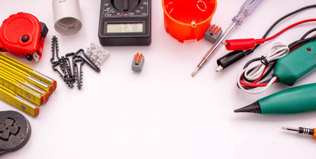 Electrical Tools and Components on White Background.